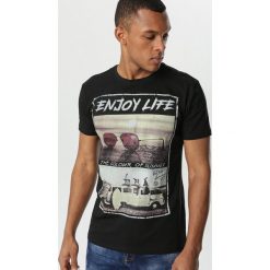 Czarna Koszulka Kyley. Czarne koszulki męskie Born2be, xl, bez wzorów, bez kołnierzyka, bez rękawów. W wyprzedaży za 39,99 zł.