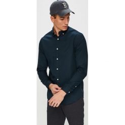 Armani Exchange - Koszula. Niebieskie koszule męskie Armani Exchange, m, bez wzorów, z bawełny, casualowe, button down, z długim rękawem. W wyprzedaży za 249,90 zł.