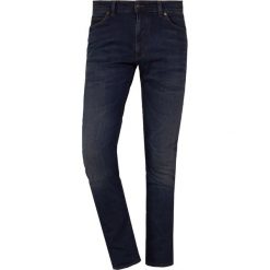 DRYKORN JAW Jeansy Slim Fit dark blue. Niebieskie jeansy męskie regular DRYKORN, z bawełny. Za 629,00 zł.