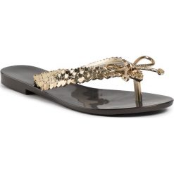 Japonki MELISSA - Harmonic Chrome V Ad 32722 Black/Gold 50919. Żółte klapki damskie Melissa, bez wzorów, z tworzywa sztucznego, bez obcasa, na obcasie. Za 269,00 zł.
