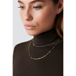 NA-KD Accessories Naszyjnik Double Star - Gold. Brązowe naszyjniki damskie NA-KD Accessories. Za 40,95 zł.