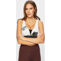 Nike - Biustonosz. Białe biustonosze sportowe damskie marki Nike, s, z elastanu. Za 159,90 zł.