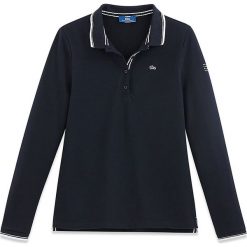 Koszulka polo w kolorze granatowym. Niebieskie koszulki damskie TBS, z haftami, z bawełny, klasyczne, polo. W wyprzedaży za 65,95 zł.