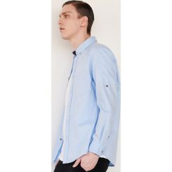 Koszula regular fit - Niebieski. Niebieskie koszule męskie Reserved, xl, bez wzorów, bez kołnierzyka, bez rękawów. Za 89,99 zł.