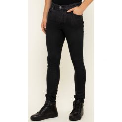 Jeansy Slim Fit John Richmond RMA19069JE. Czarne jeansy męskie John Richmond, m, bez wzorów, z elastanu. W wyprzedaży za 629,00 zł.