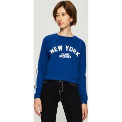 Bluza z lampasami - Niebieski. Niebieskie bluzy damskie Sinsay, s, bez wzorów, bez rękawów, bez kaptura. W wyprzedaży za 29,99 zł.