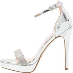 ALDO ONYWEN Sandały na obcasie silver. Szare rzymianki damskie ALDO, z materiału, na obcasie. Za 359,00 zł.