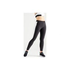Legginsy fitness cardio damskie. Czarne legginsy sportowe damskie DOMYOS, l, bez wzorów, z elastanu, na fitness i siłownię. Za 64,99 zł.