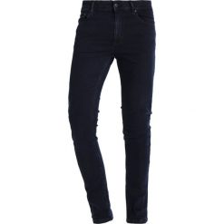 Jeansy męskie: Whyred LOU Jeans Skinny Fit heavy stone blue black
