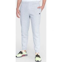 Lacoste Motion Spodnie dresowe Szary. Szare spodnie męskie Lacoste, xxl, bez wzorów, z elastanu. Za 490,95 zł.