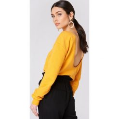 NA-KD Basic Sweter z głębokim dekoltem z tyłu - Orange. Pomarańczowe swetry damskie NA-KD Basic, bez wzorów, bez rękawów, bez kaptura. W wyprzedaży za 40,47 zł.