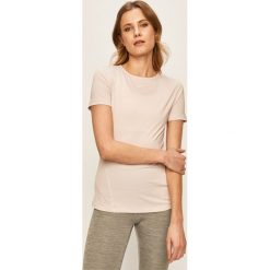 Nike - T-shirt. Białe topy damskie Nike, s, bez wzorów, z elastanu, z okrągłym kołnierzem. W wyprzedaży za 99,90 zł.