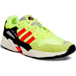 Buty adidas - Yung-96 EE7246 Hireye/Solred/Owhite. Żółte półbuty męskie Adidas, na co dzień, bez wzorów, ze skóry, bez zapięcia. W wyprzedaży za 259,00 zł.
