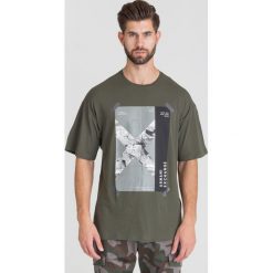 T-SHIRT ARMANI EXCHANGE. Brązowe t-shirty męskie s, z nadrukiem, z bawełny, z okrągłym kołnierzem. Za 114,50 zł.