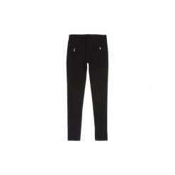 Spodnie damskie legginsy z kieszeniami gładkie, z zamkiem. Czarne legginsy TXM. Za 29,99 zł.