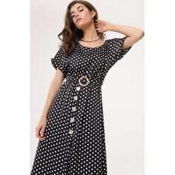 Czarna Sukienka Delightfulness. Czarne sukienki damskie Born2be, s, bez wzorów, bez kołnierzyka, bez rękawów, midi. Za 99,99 zł.