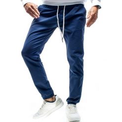 Spodnie męskie joggery na gumce granatowe Recea. Spodnie męskie Recea, s, bez wzorów, z bawełny. Za 99,99 zł.