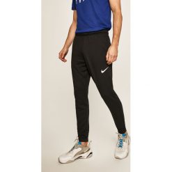 Nike - Spodnie. Czarne spodnie męskie Nike, na co dzień, s, bez wzorów, z poliesteru. Za 169,90 zł.