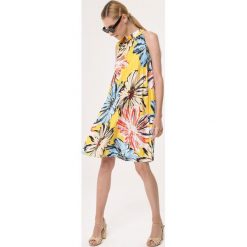 Żółta Sukienka Pebbly Beach. Żółte sukienki damskie Born2be, na lato, s, bez wzorów, z tkaniny, bez kołnierzyka, bez rękawów, oversize. Za 69,99 zł.