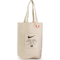 Torebka NIKE - BA6027 123 Beżowy. Brązowe torebki damskie sportowe Nike, bez wzorów, z materiału, sportowe, bez dodatków. Za 99,00 zł.