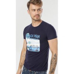 Granatowa Koszulka Cirithera. Niebieskie koszulki męskie Born2be, xl, bez wzorów, bez kołnierzyka, bez rękawów. W wyprzedaży za 24,99 zł.