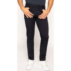 Jeansy Slim Fit Armani Exchange 3H1J06 1N4ZZ 0922. Niebieskie jeansy męskie Armani Exchange, m, bez wzorów. W wyprzedaży za 479,00 zł.
