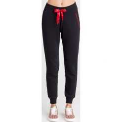 SPODNIE DRESOWE ARMANI EXCHANGE. Czarne spodnie damskie Armani Exchange, s, z dresówki. Za 269,00 zł.