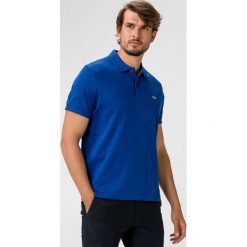 Lacoste Polo Koszulka Niebieski. Niebieskie podkoszulki męskie Lacoste, s, bez wzorów, z bawełny, polo, bez rękawów. Za 447,95 zł.