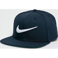 Nike Sportswear - Czapka Swoosh Pro. Niebieskie czapki męskie marki Nike Sportswear, z poliesteru. W wyprzedaży za 59,90 zł.