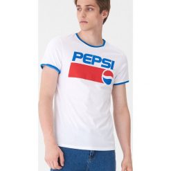 T-shirt z nadrukiem Pepsi - Biały. Białe t-shirty męskie House, s, z nadrukiem, bez kołnierzyka. Za 49,99 zł.