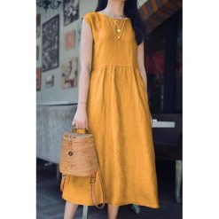 Sukienka FAUNA MUSTARD. Żółte sukienki damskie IVET, na co dzień, bez wzorów, eleganckie, bez kołnierzyka, bez rękawów. W wyprzedaży za 69,00 zł.