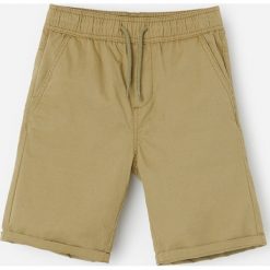 Bawełniane bermudy - Khaki. Brązowe spodenki i szorty męskie Reserved, bez wzorów, z bawełny. W wyprzedaży za 25,99 zł.