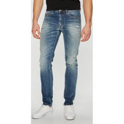 Diesel - Jeansy Thommer. Niebieskie jeansy męskie marki Diesel, z elastanu. Za 869,90 zł.
