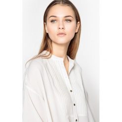 Bluzki damskie: Bluzka asymetryczna, plisowany plastron