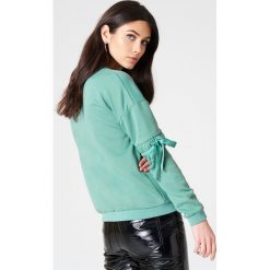 Rut&Circle Sweter z rękawem z elastyczną wstawką Thora - Green. Zielone swetry damskie marki Rut&Circle, bez wzorów, bez rękawów, bez kaptura. W wyprzedaży za 48,58 zł.