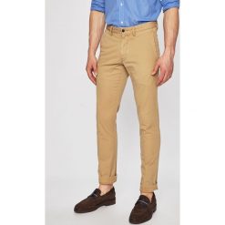 Polo Ralph Lauren - Spodnie. Brązowe spodnie męskie Polo Ralph Lauren, na co dzień, bez wzorów, z elastanu, casualowe. Za 639,90 zł.