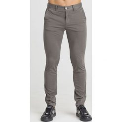 SPODNIE Armani Exchange. Brązowe spodnie męskie m, z elastanu. Za 235,00 zł.