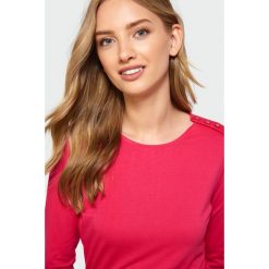 Dopasowany top. Bluzki damskie Greenpoint, w koronkowe wzory, z elastanu, bez kołnierzyka, bez rękawów. Za 39,99 zł.