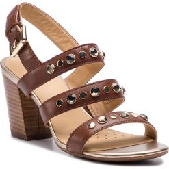 Sandały GEOX - D Eudora H D828ZH 00043 C0013 Brown. Pomarańczowe klapki damskie Geox, bez wzorów, ze skóry ekologicznej, bez obcasa, na obcasie. W wyprzedaży za 359,00 zł.