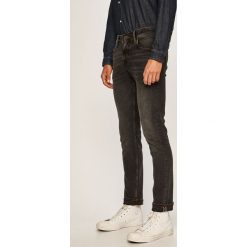 Tommy Hilfiger - Jeansy Bleecker. Szare jeansy męskie TOMMY HILFIGER, bez wzorów, z obniżonym stanem. W wyprzedaży za 349,90 zł.