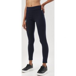 Granatowe Legginsy Kelesha. Niebieskie legginsy damskie Born2be, s, bez wzorów. Za 69,99 zł.