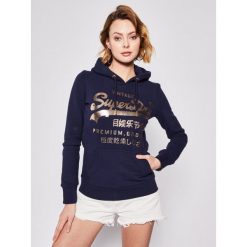Bluza Superdry PG Metalic Entry W2010047B. Pomarańczowe bluzy damskie Superdry, bez wzorów, z bawełny, bez rękawów, bez kaptura. Za 339,00 zł.