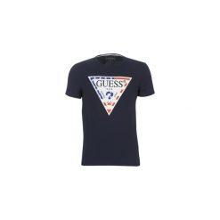 T-shirty z krótkim rękawem Guess CN SS STARS STRIPES TEE. Niebieskie t-shirty męskie Guess, s, z aplikacjami, bez kołnierzyka, krótkie. Za 159,00 zł.