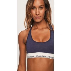 Calvin Klein Underwear - Biustonosz sportowy. Niebieskie biustonosze sportowe damskie Calvin Klein Underwear, s, bez wzorów, z elastanu. W wyprzedaży za 89,90 zł.