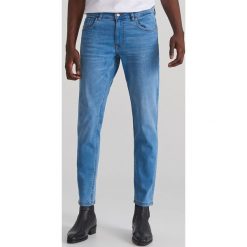 Spodnie jeansowe slim - Niebieski. Niebieskie spodnie damskie Reserved, m, bez wzorów, z jeansu. Za 169,99 zł.