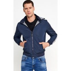 Granatowa Dwustronna Kurtka Pasilea. Niebieskie kurtki męskie Born2be, xl, bez wzorów, bez kaptura. Za 149,99 zł.