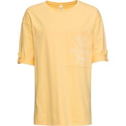 T-shirt z kieszonką bonprix matowy żółty - beżowy perłowy. Żółte koszulki damskie bonprix, bez wzorów, bez kołnierzyka, bez rękawów. Za 59,99 zł.