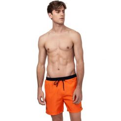 Szorty kąpielowe w kolorze pomarańczonym. Pomarańczowe kąpielówki męskie HUGO BOSS, s, w paski, z materiału. W wyprzedaży za 139,95 zł.