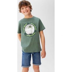 Mango Kids - T-shirt dziecięcy Paradise 110-164 cm. Żółte t-shirty chłopięce Mango Kids, z nadrukiem, z bawełny, bez rękawów. Za 45,90 zł.