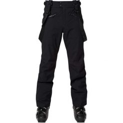 ROSSIGNOL Spodnie CLASSIQUE PANT black. Czarne spodnie męskie Rossignol, m, bez wzorów. Za 1080,00 zł.